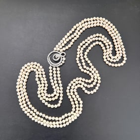 Diamond and Platinum Opera Length Three Strand Pearl Necklace