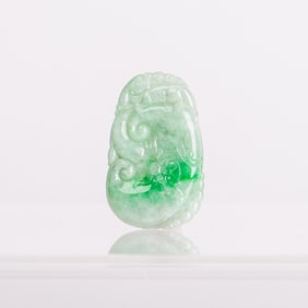 A Jadeite Pendant Carved with Ruyi Patterns