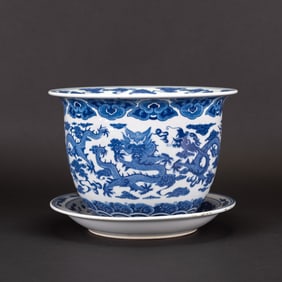 A Chinese 'Dragon' Blue and White Flower Pot with Undercarriage Plate