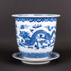 A Pair of Chinese Blue and White Jars with Two Plates