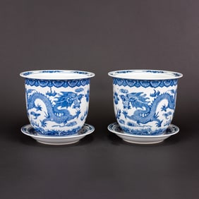 A Pair of Blue and White 'Dragon' Jardinieres and Plates