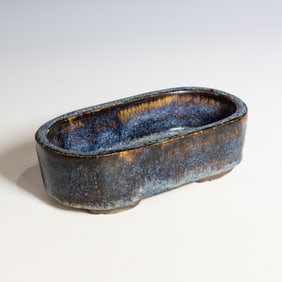 A Shiwan Flambe-Glazed Oval Vessel with Mark, Qing Dynasty