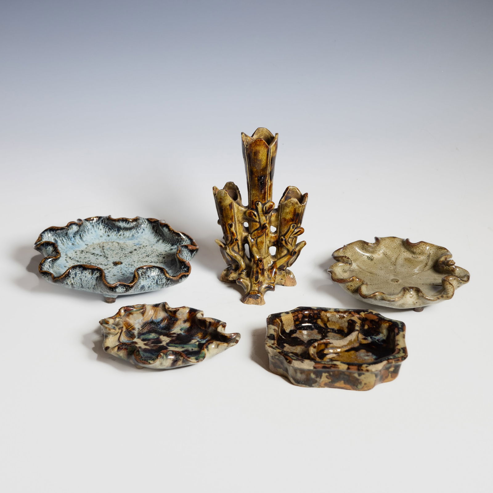 A Group of Five Chinese Shiwan Saucers and Incense Holder, Republic Period (1 of 19)