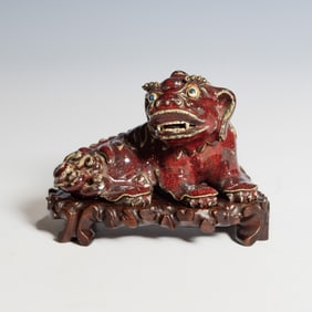 A Chinese Shiwan Red-Glazed Lion with Mark and Base, Qing Dynasty