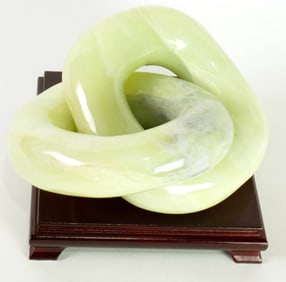 A Chinese hardstone interlocking ring sculpture, Senator Feinstein Estate