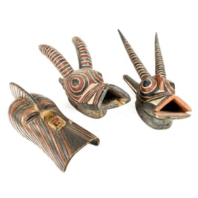 Three African carved and polychrome masks, Senator Feinstein Estate