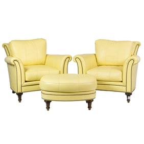 A pair of Chaddock leather lounge chairs and ottoman, Senator Feinstein Estate