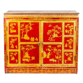 A lacquer and partial gilt two door cabinet, Senator Feinstein Estate