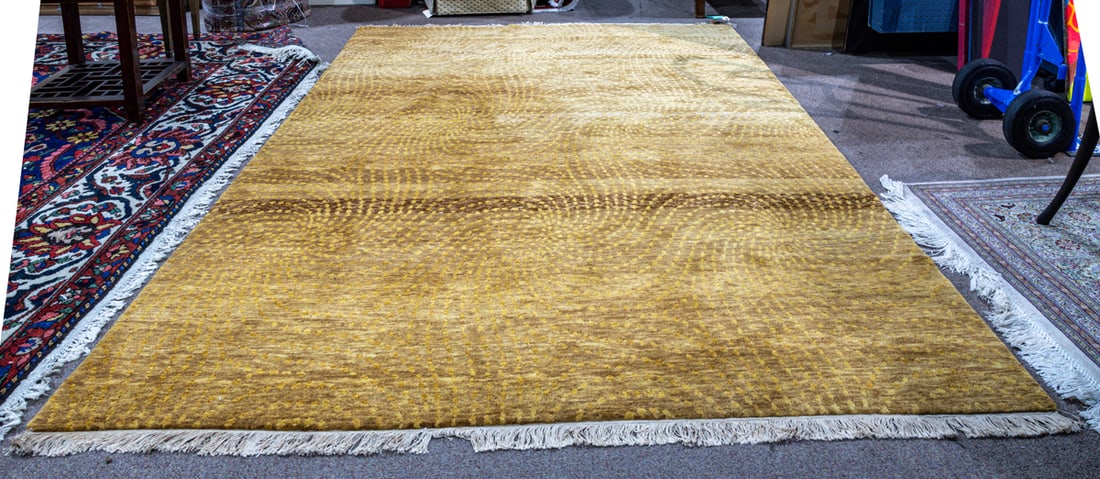 A contemporary Nepalese carpet, Senator Feinstein Estate: A contemporary Nepalese carpet with Diamond Swirl label to underside, 6' x 9'. Provenance: The Estate of Senator Dianne Feinstein (1933-2023)
