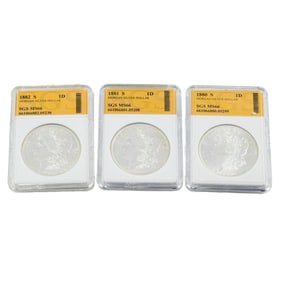 Three Morgan silver dollars
