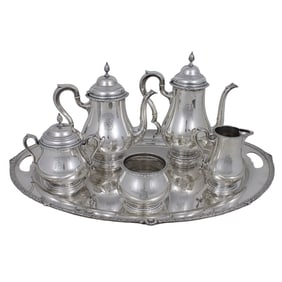 A six-piece International sterling tea and coffee service, each with Krusi Family crest