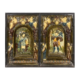 A pair of German faience stove tiles