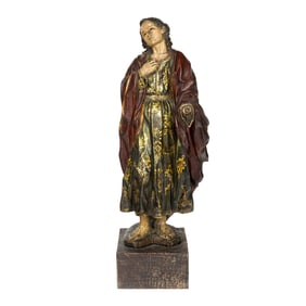 A Spanish polychrome and gilt figure of St. John