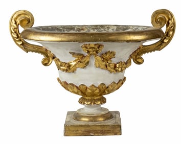 A rare Italian Neoclassical painted and parcel gilt niche urn