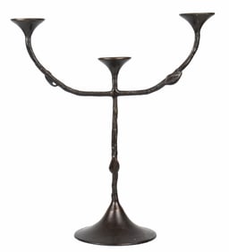 A patinated bronze three-light candelabrum