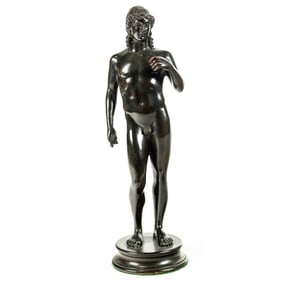 A Continental Grand Tour patinated bronze figure of the Apollo Citharoedus