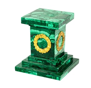 A diminutive gilt bronze mounted malachite veneered pedestal in the Russian Neoclassical taste