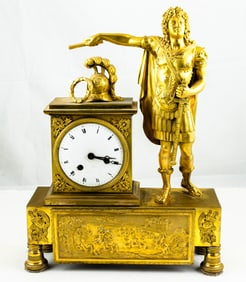 An Empire gilt bronze mantel clock