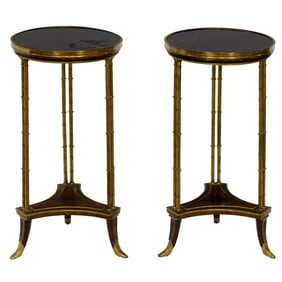 A pair of Louis XVl style gilt bronze and marble top gueridons