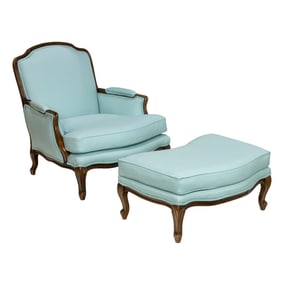 A large Louis XV style bergere and ottoman in "Tiffany" pale blue leather