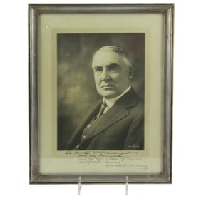 A framed photograph of President Warren G. Harding