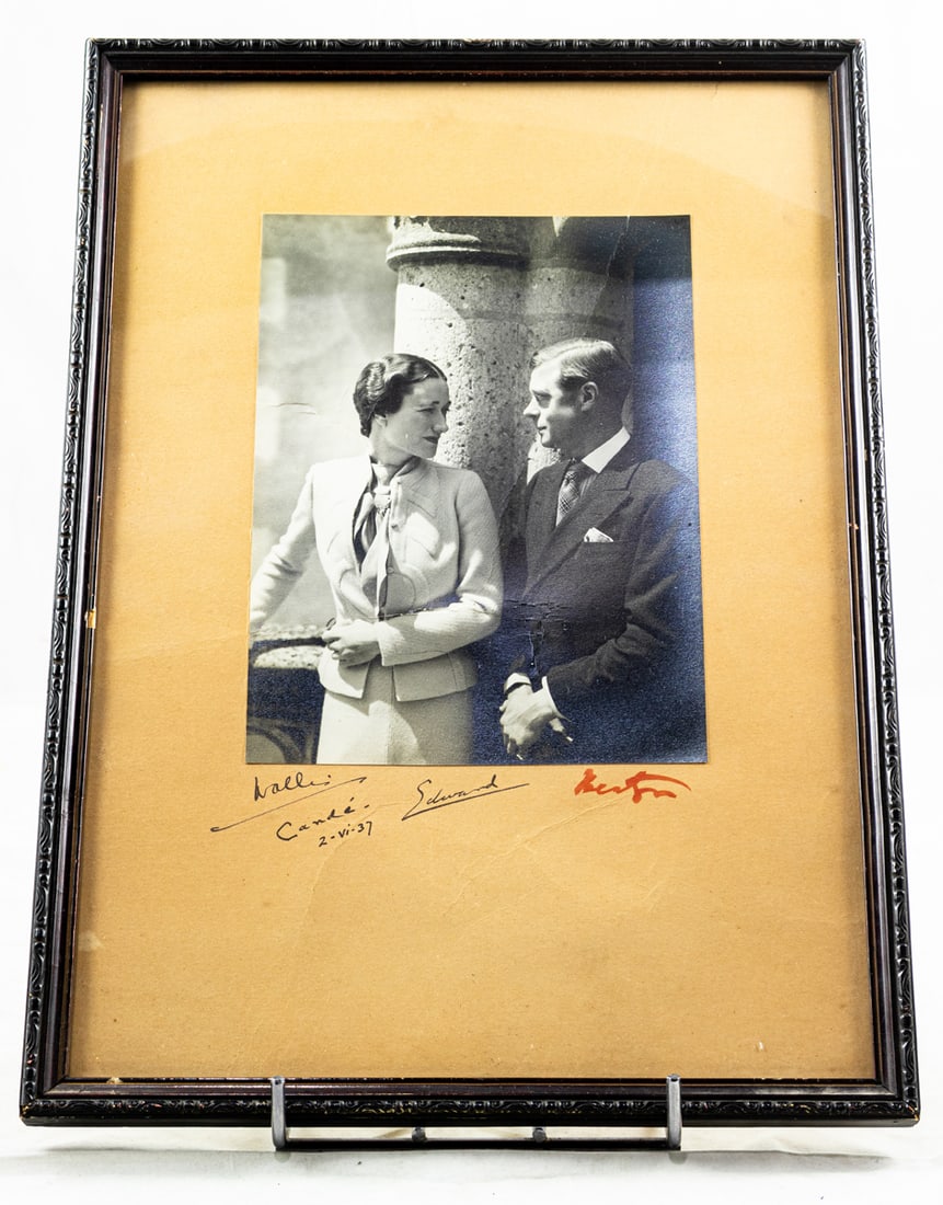 A silver gelatin photograph of Wallis Simpson and the Duke of Windsor from 1937: A silver gelatin photograph of Wallis Simpson and the Duke of Windsor from 1937, bearing signatures of Edward and Wallis, as well as the signature of Cecil Beaton. Photo is mounted on card, photograph