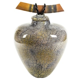 An American studio art glass jar with bamboo form handle