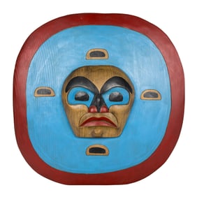 A Pacific Northwest Kwakiutl carved cedar moon mask portrait by Ian Joseph (Squamish Tribe)