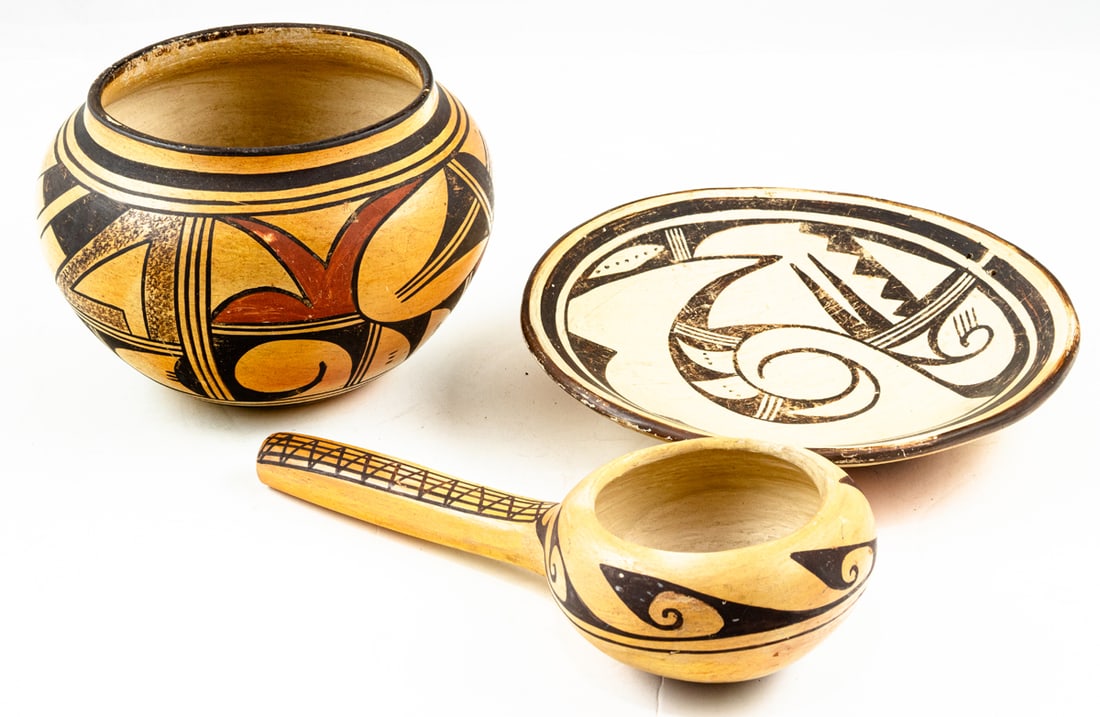 A group of Hopi polychrome pottery: A group of Hopi polychrome pottery, comprising ladle, 11"l; bowl, 5.5"h and shallow bowl, 9.25"dia [3 total]