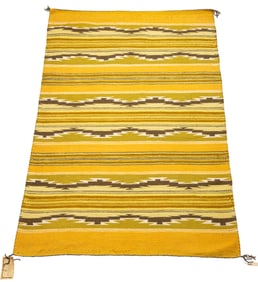 A Navajo Wide Ruins rug woven by Elsie Bowman