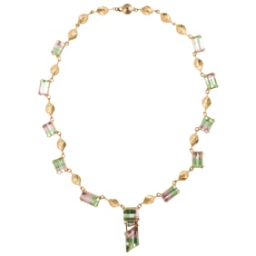 A watermelon tourmaline and 14k gold necklace