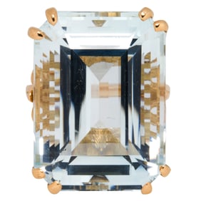 An aquamarine and 18k gold ring