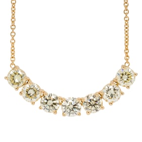 A diamond, 14k, and 18k gold necklace