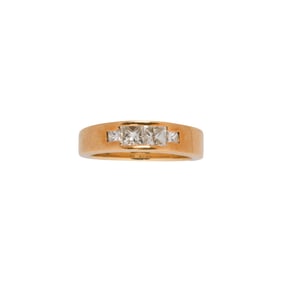 A diamond and 14k gold ring