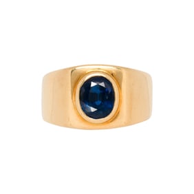 A sapphire and 18k gold ring