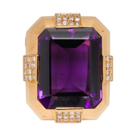 An amethyst, diamond, and 18k gold brooch