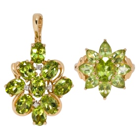 A peridot, diamond, and 14k gold pendant and ring