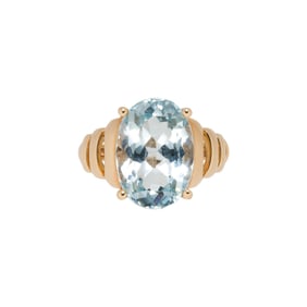 An aquamarine and 14k gold ring