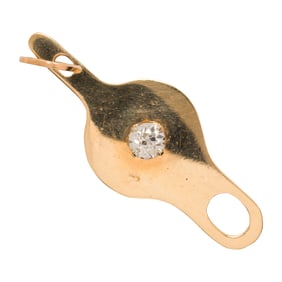 A diamond and 14k gold tool