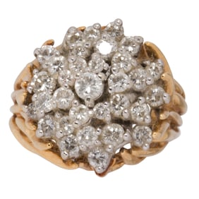 A diamond and 14k bi-color gold ring