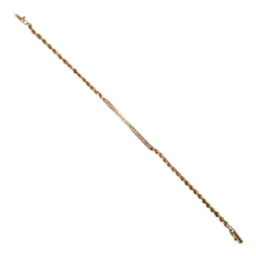 A diamond and 14k gold bracelet