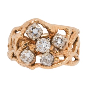 A diamond and 14k gold ring