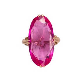 A synthetic ruby and 10k gold ring
