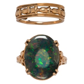 One 14k gold band and one opal triplet and 10k gold ring