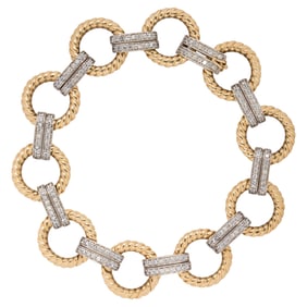 A diamond and 14k bi-color gold bracelet