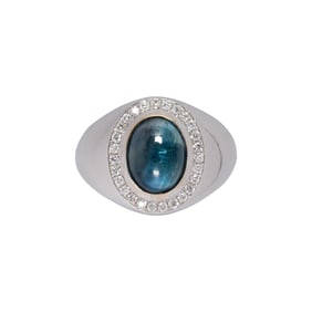 A sapphire, diamond and 18k white gold ring
