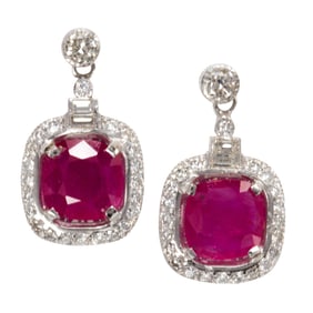 A pair of ruby, diamond, and 14k white gold earrings