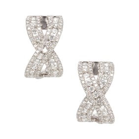 A pair of diamond and white gold earrings