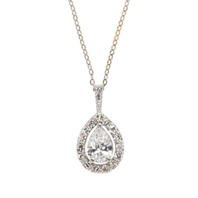 A diamond and 18k white gold pendant necklace