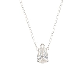 A diamond and 14k white gold solitaire necklace